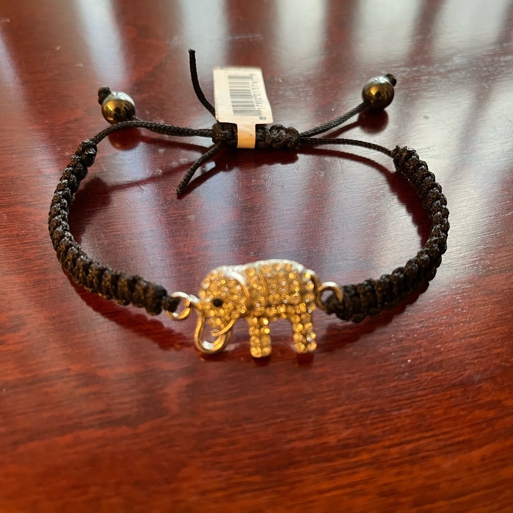 Fashionable Elephant Bracelet in rhinestone silver tone and hematite.